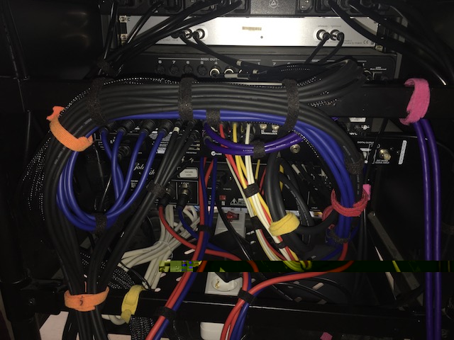 Unlike cats, spaghetti-like cabling can be somewhat tamed given enough velcro.